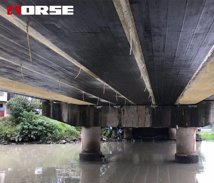 预应力碳纤维板怎么加固<font color="red">桥梁裂缝</font>